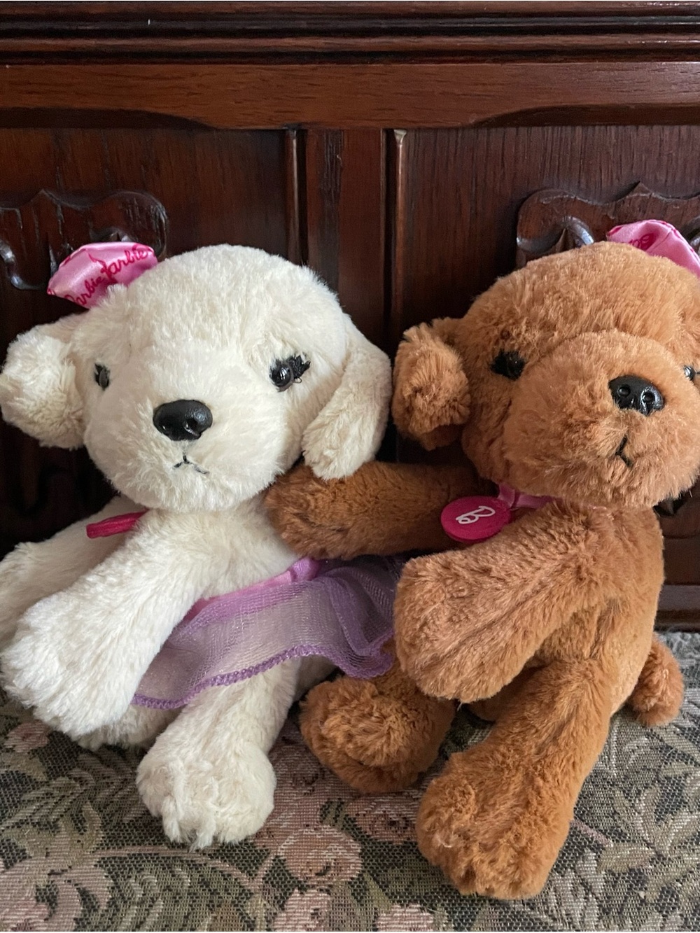 Two small Barbie plush dogs